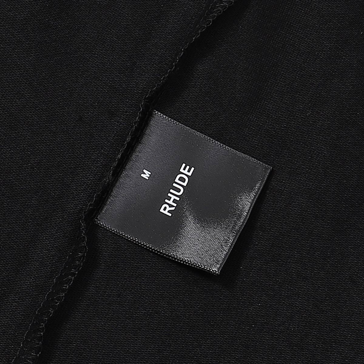 Rhude T-shirts Chevron Logo Repeat