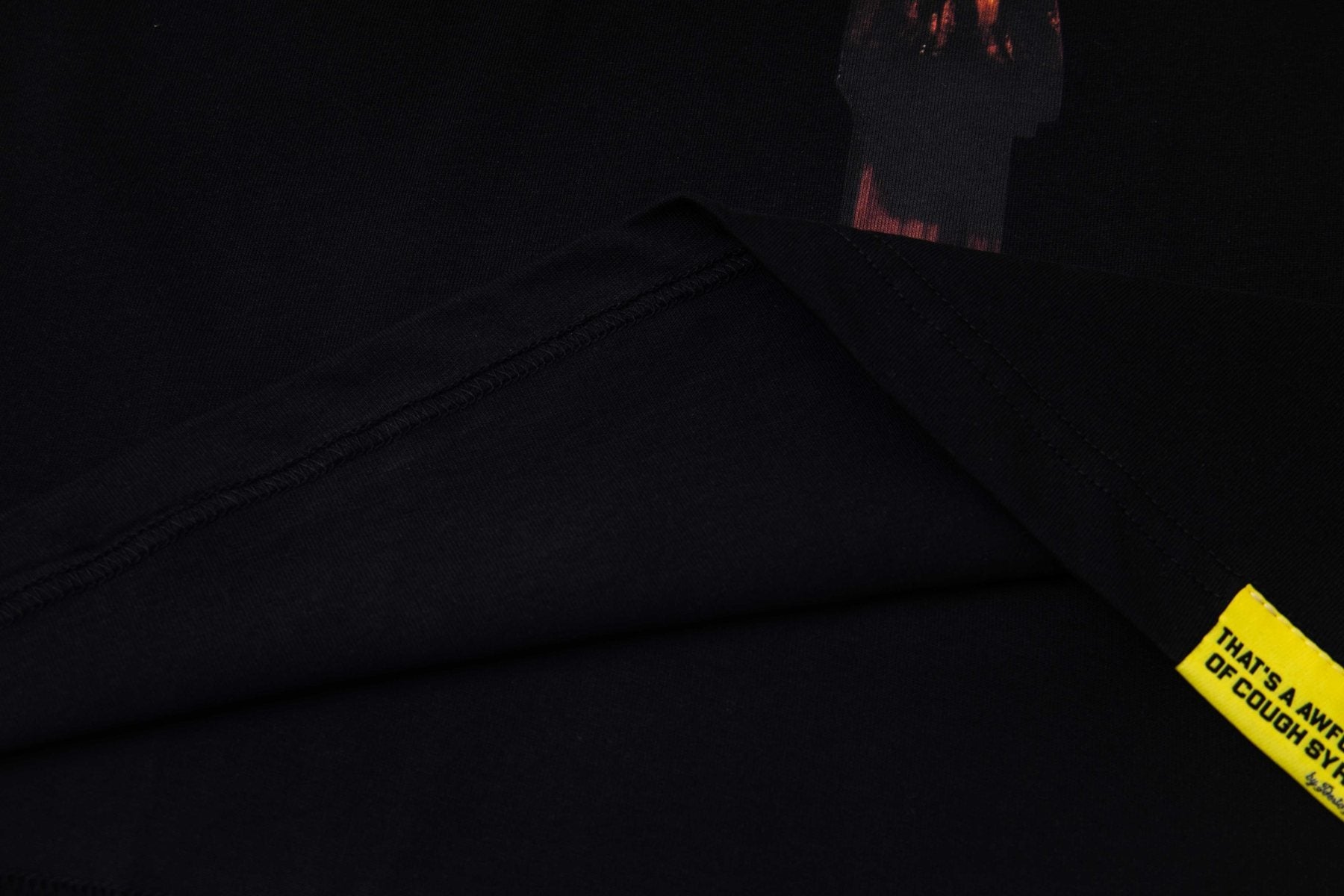 THAT'S A AWFUL LOT OF COUGH SYRUP Free Jeff Crucifix Graphic T-Shirt — detail