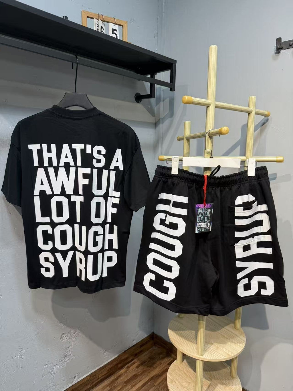 THAT'S A AWFUL LOT OF COUGH SYRUP Bold Wordmark Short-Sleeve Set — back
