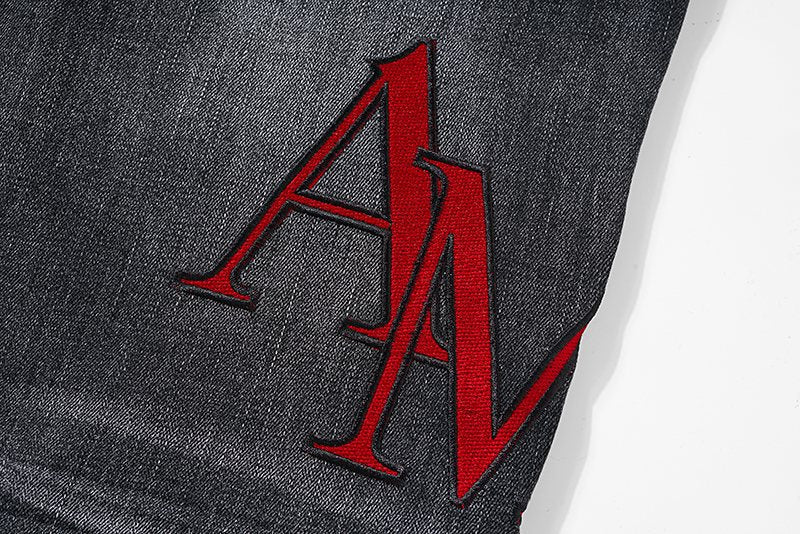 AMIRI Red Letter Graphic Washed Jeans — detail